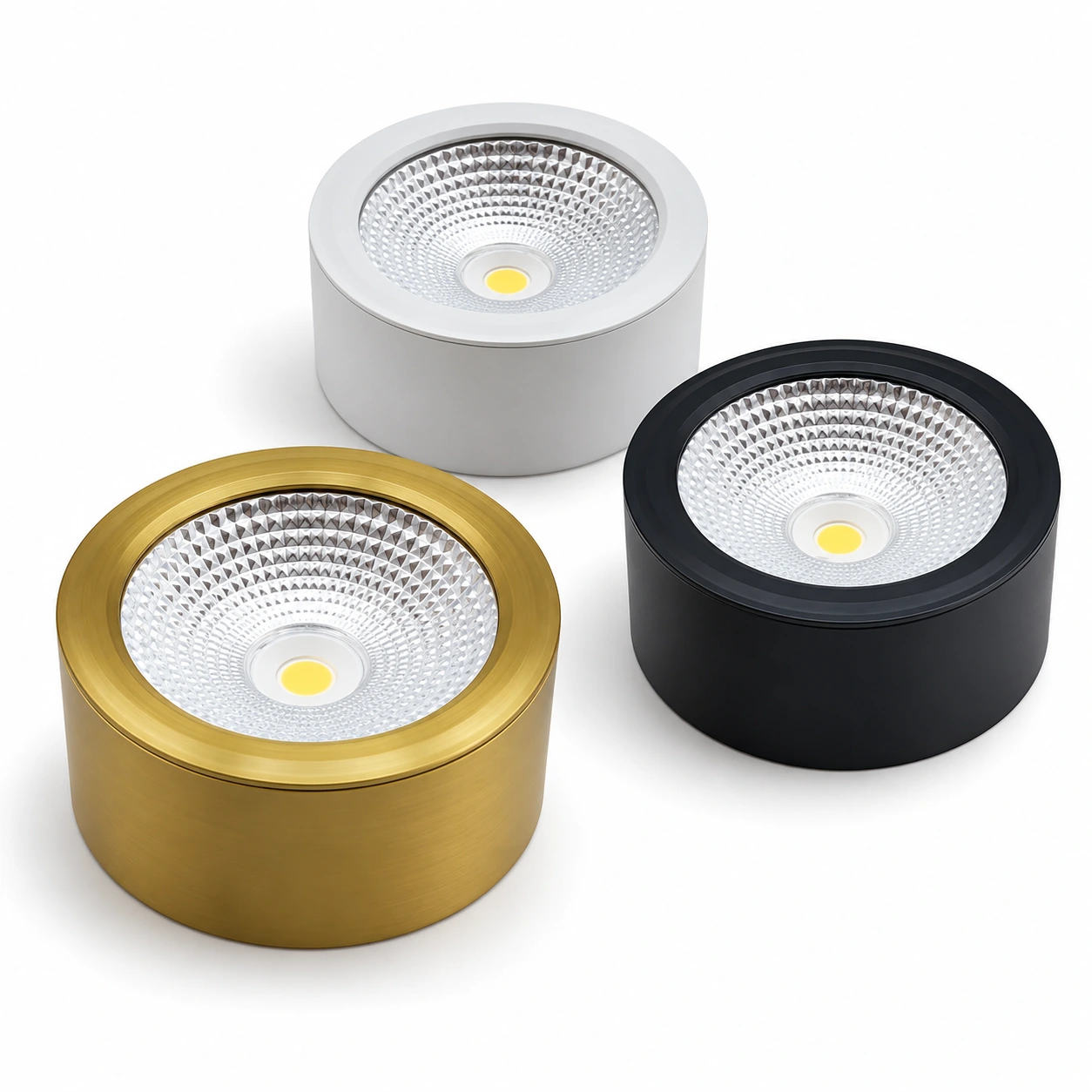 three compact cylinder downlights white black and gold finishes